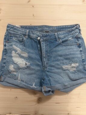 American Eagle Outfitters Denim Shorts w/ Distressed Trim - “Mom Short” fit